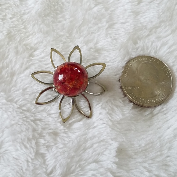 Jewelry - Small starburst brooch with amber? cabochon